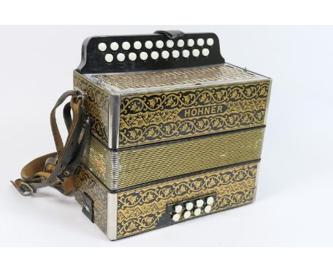 Hohner gilt decorated piano accordion, width 28cm 