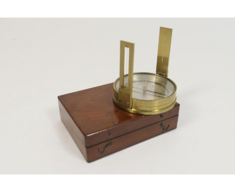 Victorian lacquered brass field compass, 65mm silvered calibrated dial contained within a mahogany carrying case 