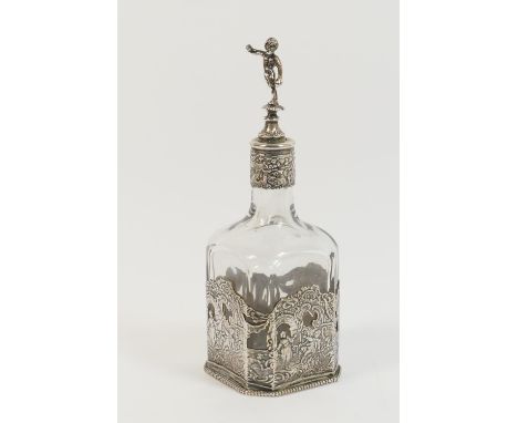 Dutch silver mounted glass scent flask, late 19th Century, having a figural stopper (glued), over a clear glass body of cante