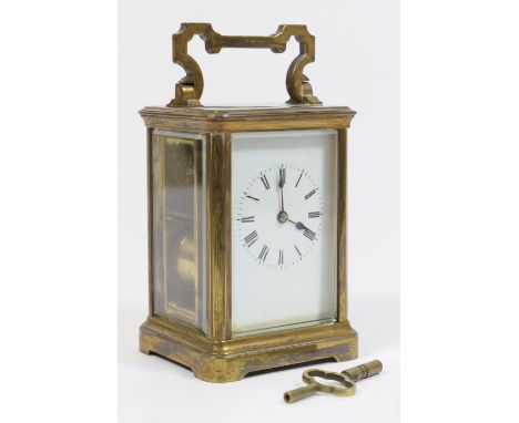 French brass carriage clock, circa 1900-20, white enamelled dial with Roman numerals, the movement striking on a gong, with k