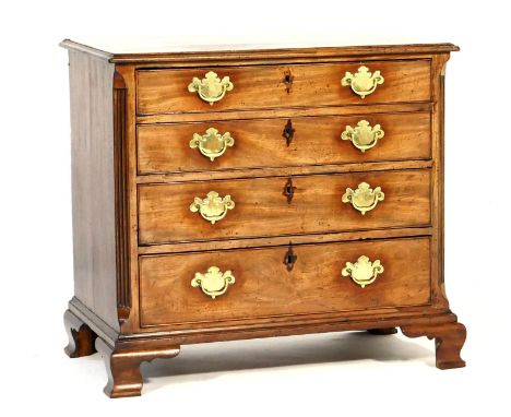 George III mahogany chest of drawers, circa 1770, fitted with four graduated long drawers with brass handles, reeded canted c