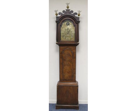 Late George III mahogany and walnut longcase clock by John Wenham of Dearham, fretwork top having three ball finials with eag