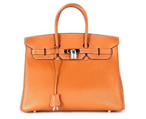 An Hermès tan togo leather Birkin, 2002, blind stamp F, with white top-stitching, silver hardware, padlock and keys; with wea