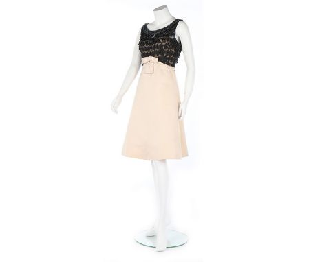 A Lanvin-Castillo couture ivory satin cocktail dress, circa 1960, labelled, the bodice heavily embellished with facetted bead