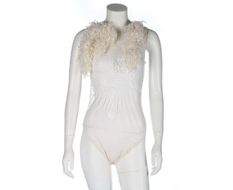 A John Galliano 'Pretty Baby' cutwork cotton body, 'Lolita' collection, Spring-Summer, 1992, unlabelled, the roundel design c