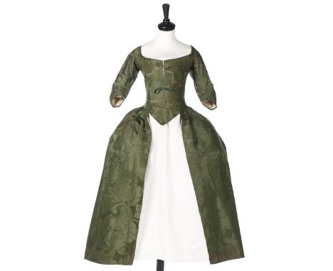 A Spitalfields forest-green damask silk robe à l'Anglaise, circa 1770, the fabric circa 1743, woven with large scale flowerhe