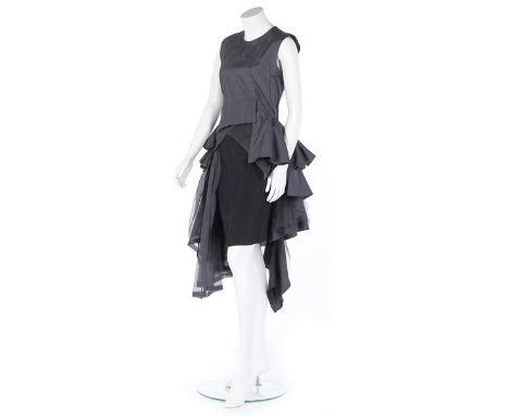 A Comme de Garçons Noir layered dress, Spring-Summer, 1988, labelled and size M, the dark grey silk dress with long tiered fl