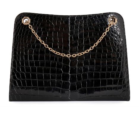 A Cartier black crocodile handbag with 9ct rolled gold chain, early 1960s, crocodylus porosus, stamped to interior, hallmarke