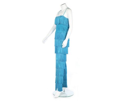 An Emilio Pucci turquoise fringed 'shimmy' suit, late 1960s, labelled, the jersey bodice and attached trousers covered with b