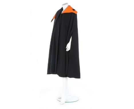 A Yohji Yamamoto cape, 'Homage to Pierre Cardin' collection, Autumn-Winter, 1989-90, labelled and size M, the double layered 