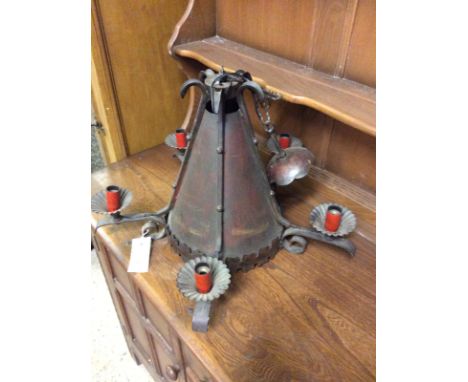 A continental metalware five branch chandelier 
