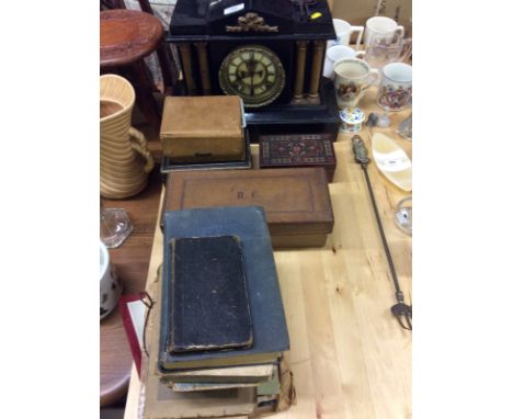 An enamelled tin mantel clock; various assorted old books and boxes to include a set of cards; an early 20th Century toilet s