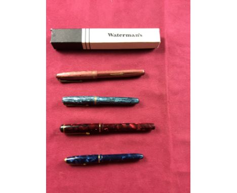 A Conway Stewart Dinky 550 fountain pen; one other Conway Stewart fountain pen; and three Watermans