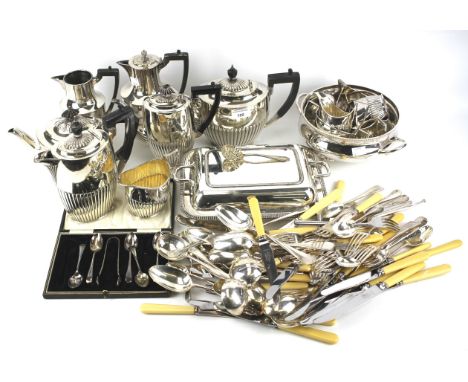 A group of silver and plated wares. Including: a cased set of silver spoons, various silver-plated tea and coffee pots, milk 