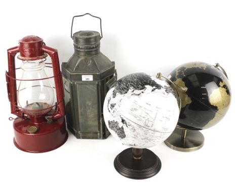 An oil lantern, an oil lamp and two globes. The first a vintage red painted oil lantern, marked Gale, the second gilt-metal w