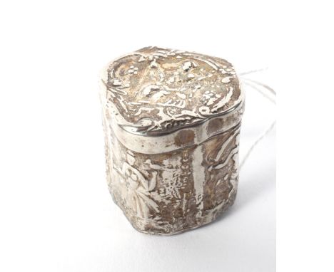 A small continental white metal trinket pot. With embossed decoration
