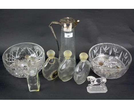 An assortment of glassware. Including a cut crystal model of a horse (damages), three Guerlain eau de toilette bottles and fr