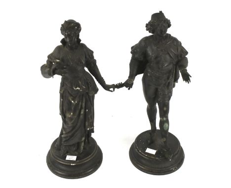 Two late 19th century French bronzed metal figures. Depicting a lady and gentleman, in period dress, the man holding a lute, 