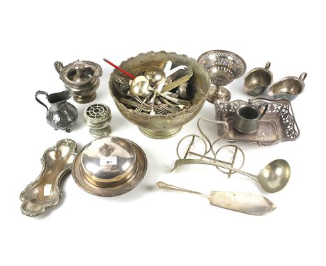 A collection of silver plate. Including: assorted flatware, a butter dish and cover, jugs, sauceboats and other items 