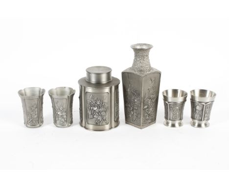 A group of Royal Selangor pewter 'four seasons' wares. All with impressed marks, comprising: a lobed tea caddy and cover, a v