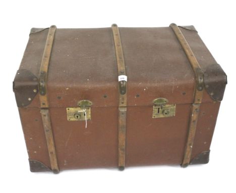 A 20th century hessian covered trunk. With wooden enforcers and brass fittings, metal handles to either side, L78cm x D52cm x