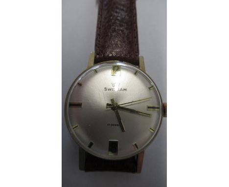 A gents Swissam manual wind watch on brown leather strap - working in the saleroom - case size 34mm