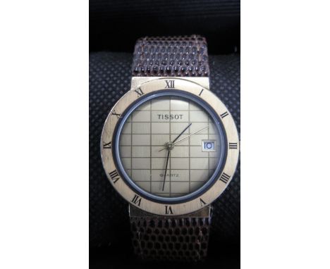 A Tissot quartz gold face watch with date on brown leather strap - 30mm face - working in the saleroom 