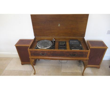 A Dynatron Record Player tuner and cassette recorder in a yew veneer cabinet - Width 98cm 