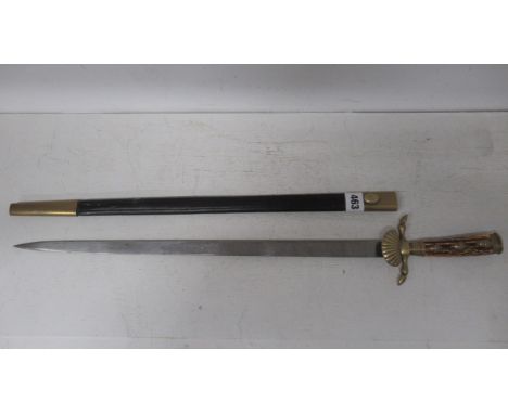 A 19th century German hunting sword with antler grip and brass mounts and etched blade, 49cm, in leather scabbard, overall le