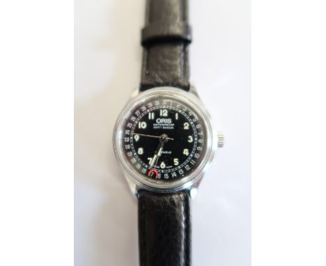 An Oris manual wind calendar/date centre, seconds, chrome plated, 30mm case, black dial, working in saleroom 