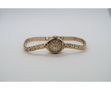 A ladies Rotary 9ct hallmarked yellow gold manual wind bracelet watch, case 15mm, approx 14.7g, working in saleroom 
