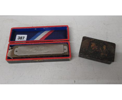A Hohner Super Chromonica, boxed, and an Indian / Persian papier mache box 