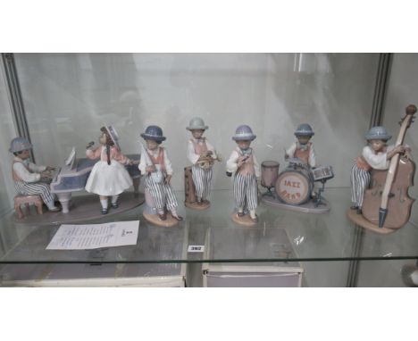 Lladro six piece Jazz band comprising pianist and singer, drum kit, saxophone, double bass, trumpet and clarinet, double bass