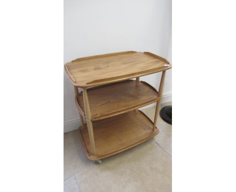 An Ercol blonde two tier tea trolley on wheels - Width 70cm x Height 78cm 