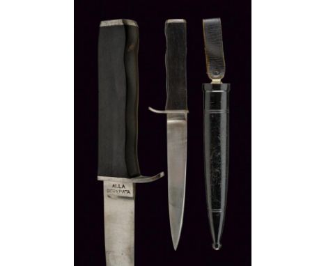 dating: About 1940 provenance: Italy, Single-edged blade, tang marked 'ALLA DISPERATA', anatomical, wooden grip with iron mou