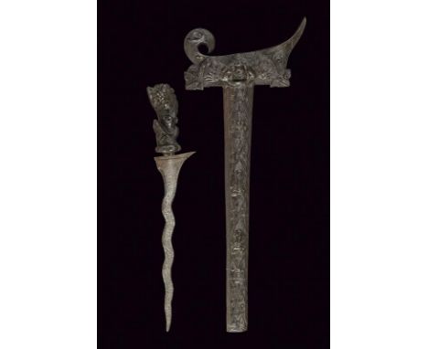 dating: First half of the 20th Century provenance: Indonesia, Undulated, double-edged blade, in pamor, enlarged at the base. 