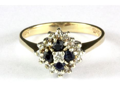 A 9ct yellow gold sapphire and diamond set cluster ring, (N.5).
