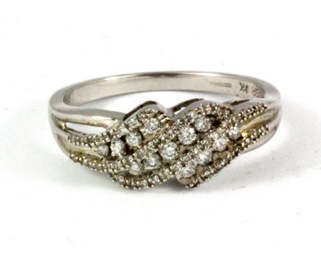 A 9ct white gold diamond set cluster ring, (Q.5).