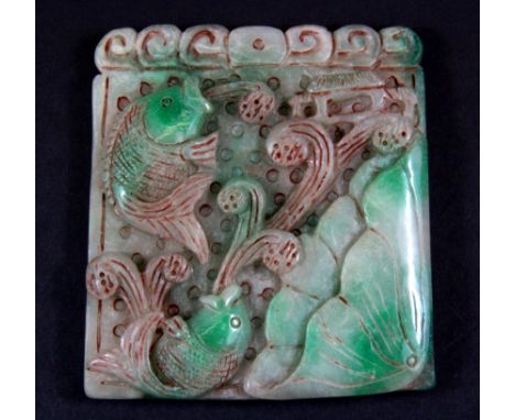 A Chinese carved jade/hardstone panel of a fish in a lotus pond, size 8.5 x 9.5cm.