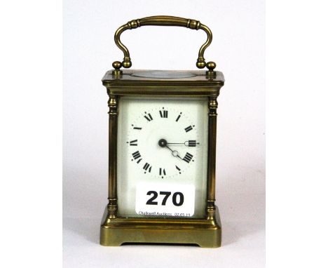 A gilt brass carriage clock, H. 14cm.