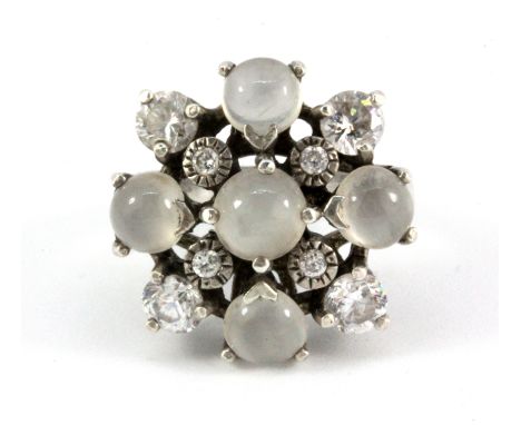 A 925 silver moonstone and cubic zirconia set cluster ring, (R.5).