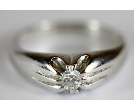 A gentleman's 18ct white gold (stamped 750) gipsy ring set with a single brilliant cut diamond, approx. 0.25ct, (W.5).