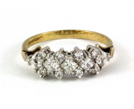 A 9ct yellow gold stone set ring, (L.5).