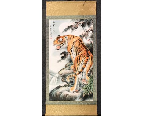 A Chinese silk mounted scroll of a tiger, size 81 x 184cm.