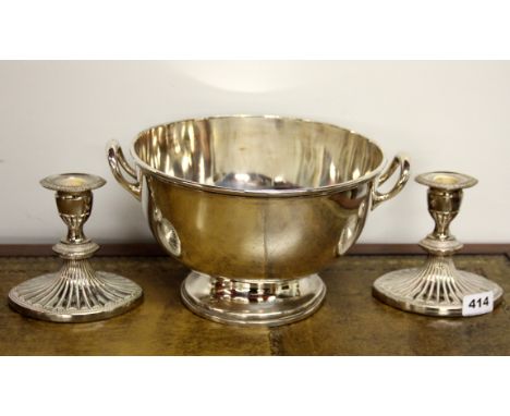 A pair of silver plated candlesticks and a punch bowl, candlestick H. 13cm.