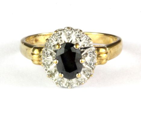 A 9ct yellow gold sapphire and diamond set cluster ring, (P).