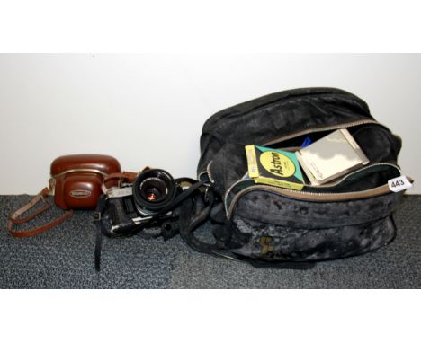 A Voigtlander camera with a Canon camera etc.