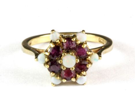 A 9ct yellow gold opal and tourmaline set cluster ring, (N.5).