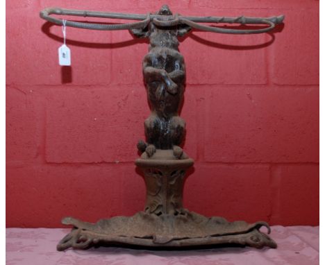 MID 19TH CENTURY COALBROOKDALE CAST IRON WALKING STICK STAND, CAST AS A CHIHUAHUA HOLDING A RIDING CROP IN HIS MOUTH AND RAIS