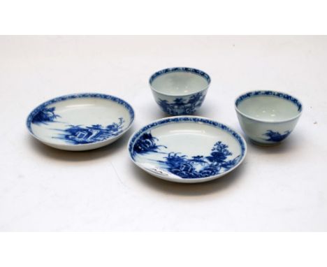 A PAIR OF NANKING CARGO BLUE AND WHITE TEA BOWLS AND SAUCERS 